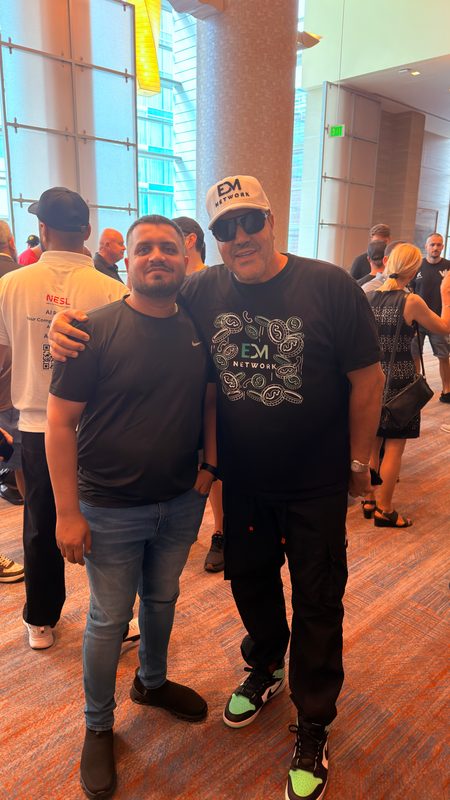 Wali Zuberi with a fellow attendee on the Contact.io 2026 market floor