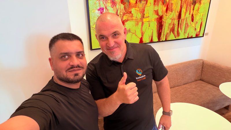 Selfie of Wali Zuberi with a fellow attendee at Contact.io 2026 in Denver
