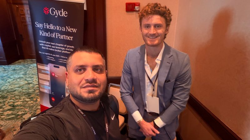 Selfie of Wali Zuberi with a fellow attendee near the MedicareCon 2026 exhibit area